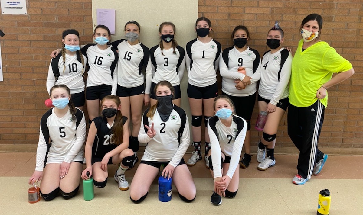 Jessie DuBose (far right) with the Basin Bombers Volleyball Club team, serving youth athletes in the Klamath Basin and surrounding areas.